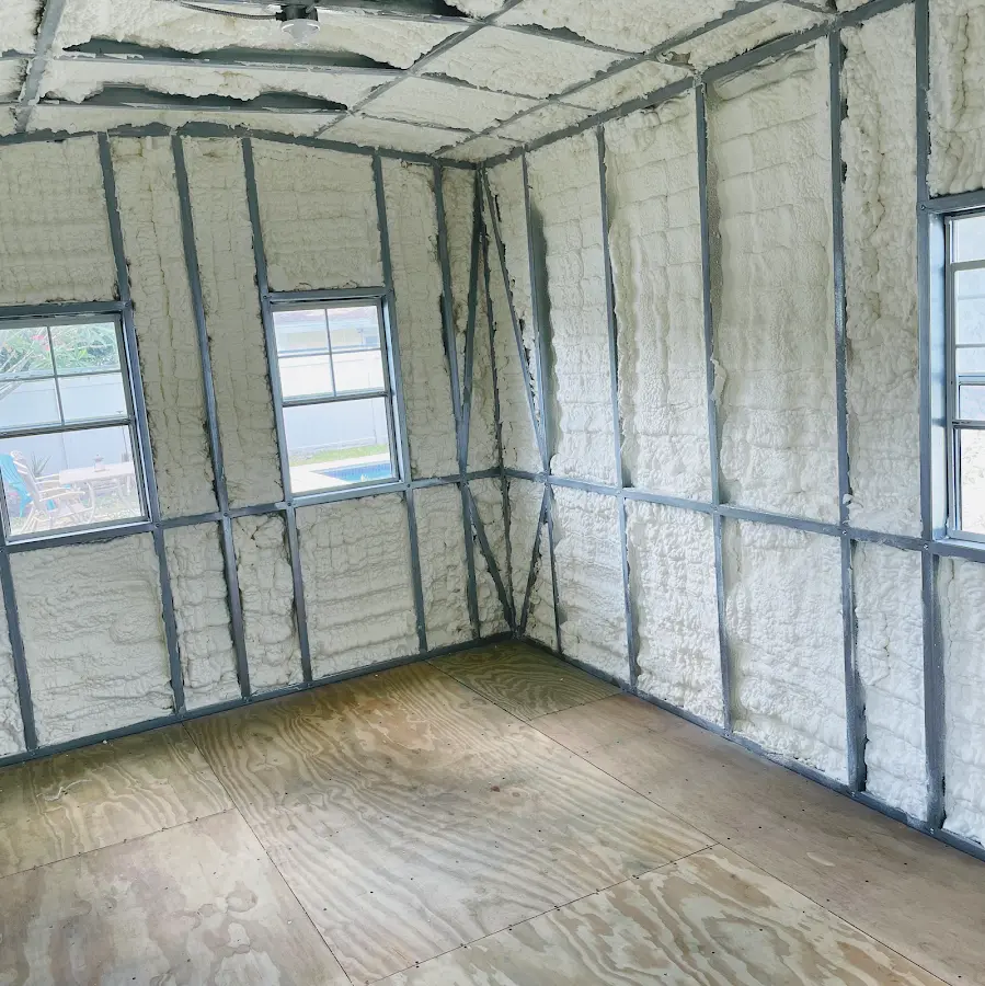 Closed-cell spray foam insulation applied to wall cavities in a residential project in Orange City